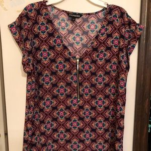 Express top, small petite, zip down front.